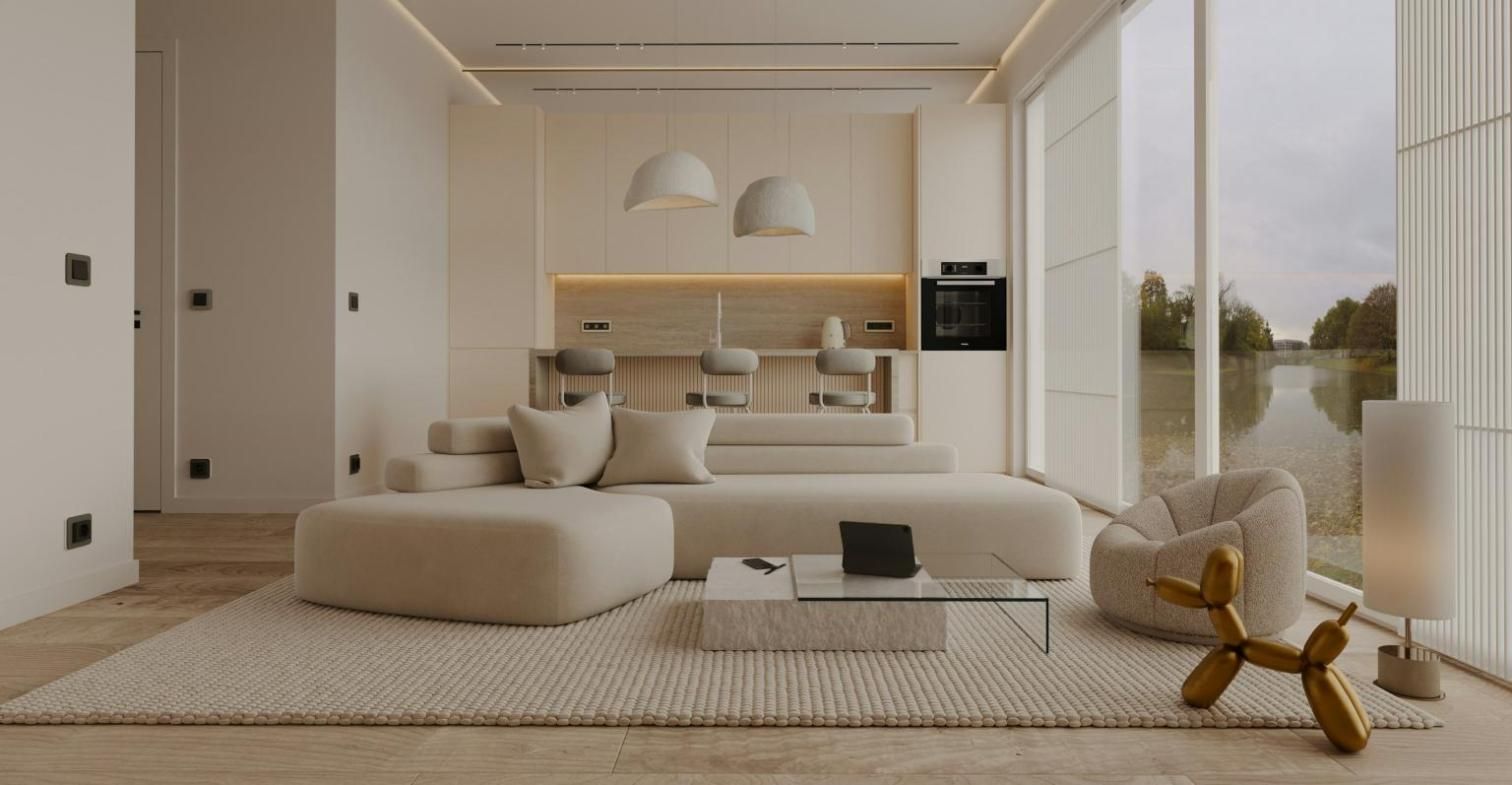 Salón moderno y minimalista con sofá claro y un gran ventanal